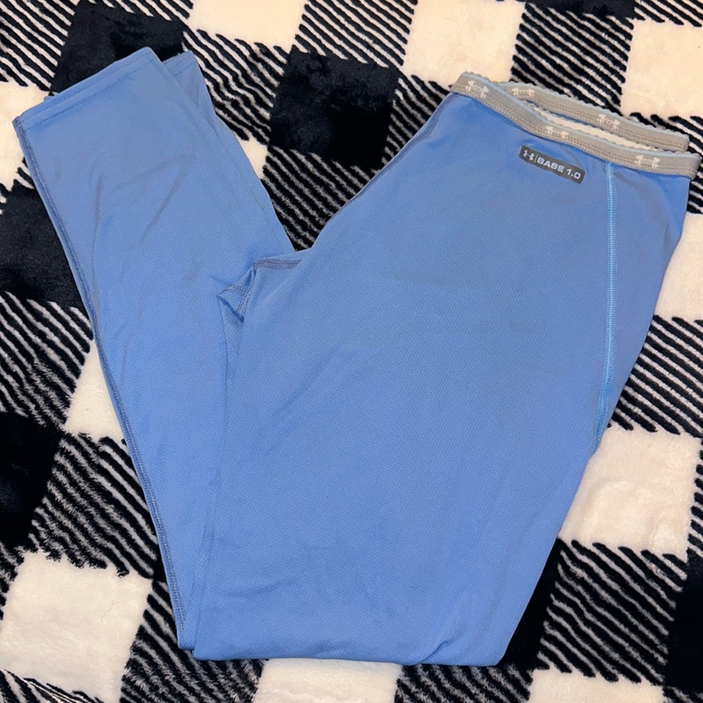 Woman’s Under Armour Base Layer Pants Size Small in the color Blue